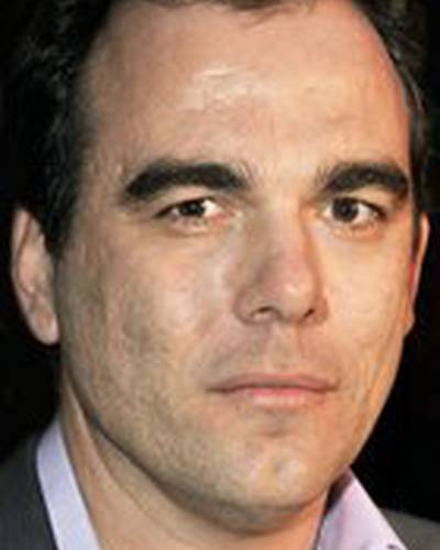 Дэннис Илиадис фото