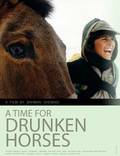 Постер из фильма "Время пьяных лошадей" - 1