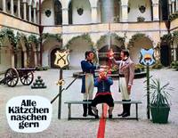 Кадр Все кошки любят полакомиться