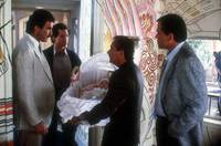 Кадр Трое мужчин и младенец