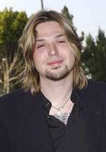 Дж. Макки Грубер фото