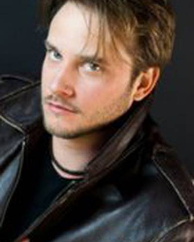 Адам Томас фото