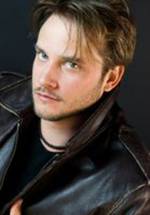 Адам Томас фото