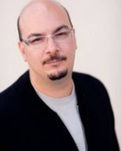 Энтони Е. Зуикер фото