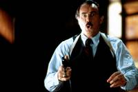 Кадр Человек в красном ботинке